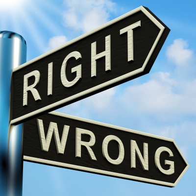 road sign with choices of right or wrong
